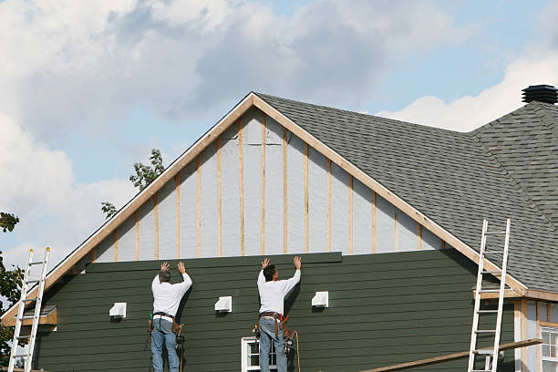 Professional Vinyl Siding technician working in McClure, PA